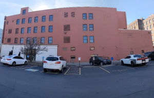 Four-story red brick wall in Downtown Evansville, Indiana.